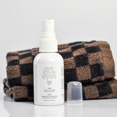 We Love Eyes chamomile eyelid cleansing spray close-up showing soothing formula.