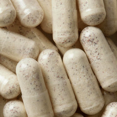 WELLBEL Men capsules added to smoothie for easy intake option.