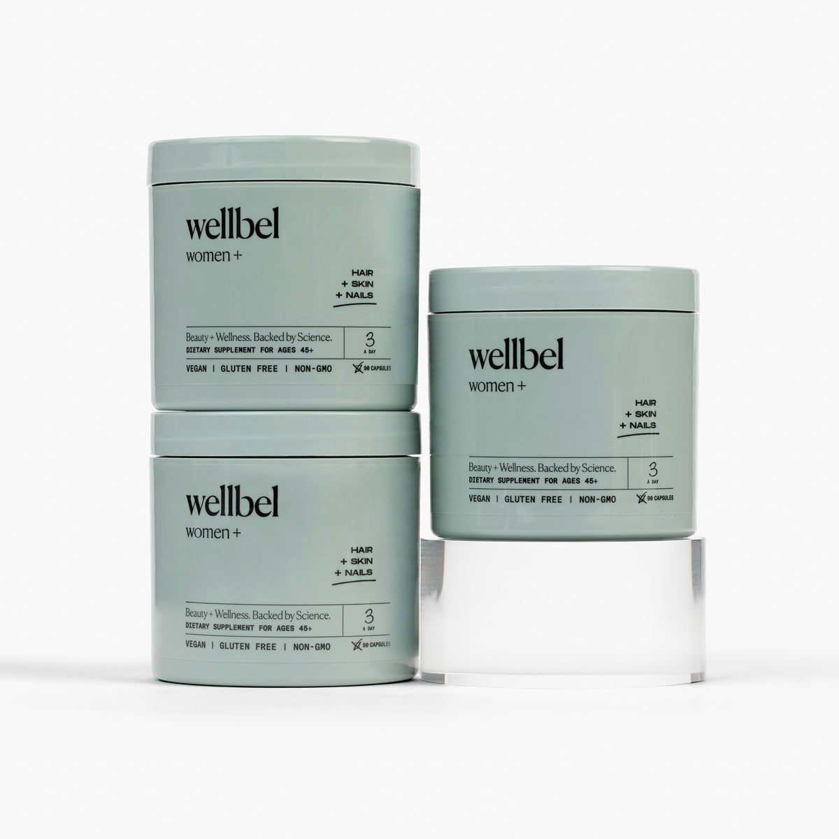 Wellbel Women+ bottle and capsules for hair, skin, and nails support.