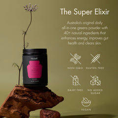 WelleCo The Super Elixir bottle beside a smoothie for easy mixing.