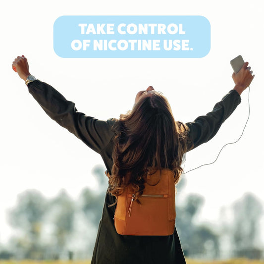 Wellness Basics mint lozenge vial close-up for portable nicotine relief.