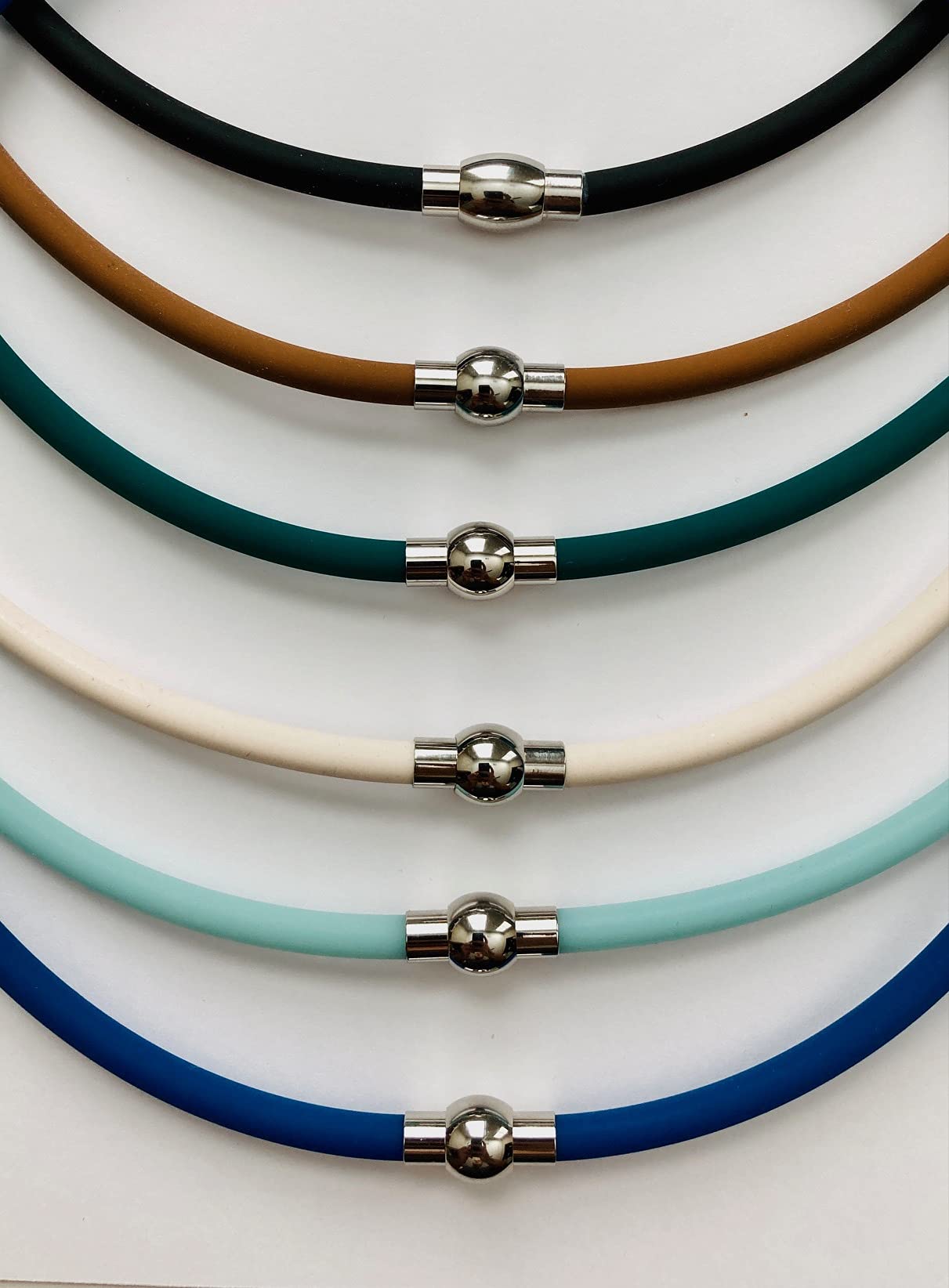 The Wellness Factor Biofield Vertigo Relief Necklace magnetic clasp closeup showing secure wear and energy flow.