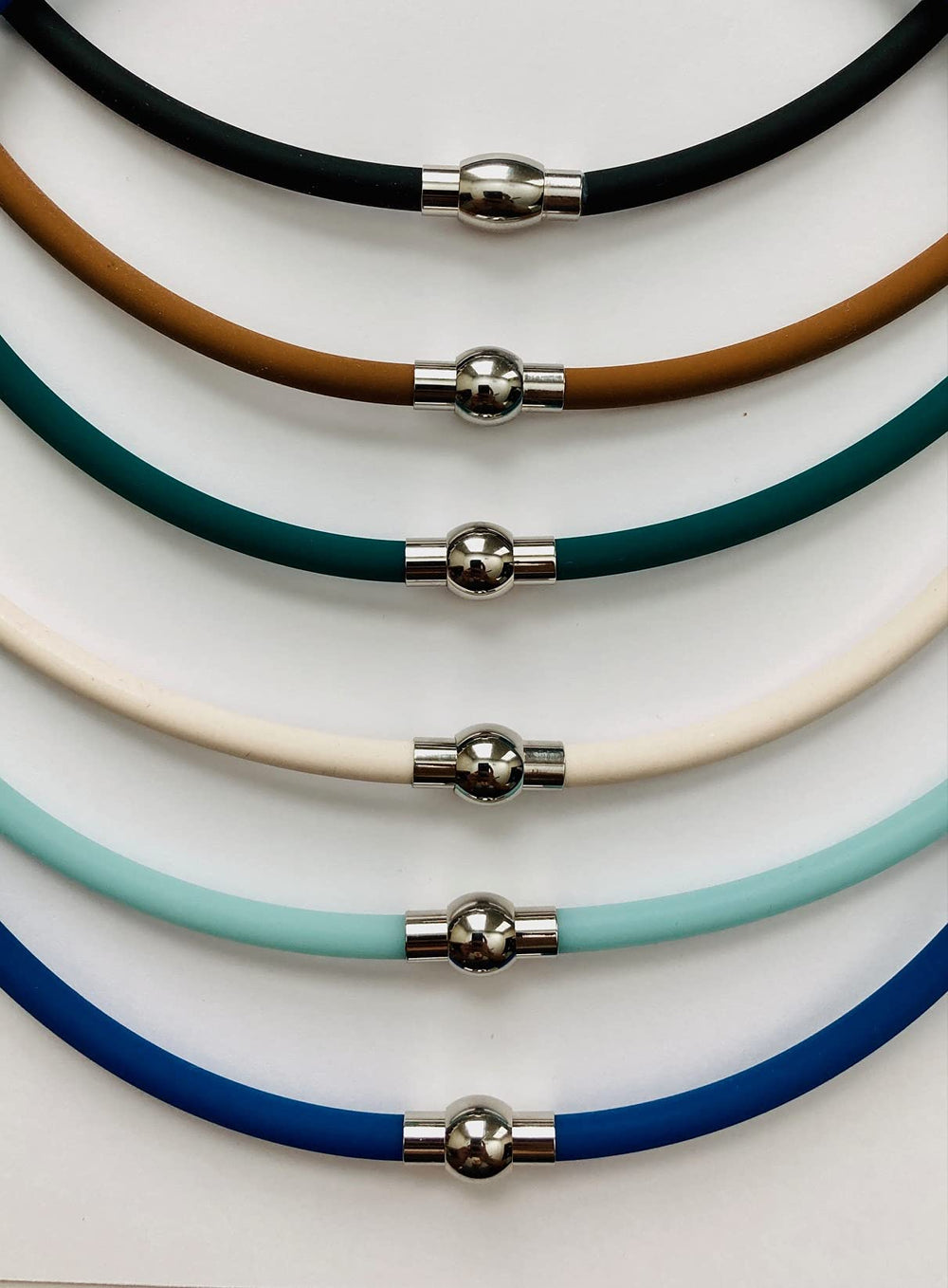 The Wellness Factor Biofield Vertigo Relief Necklace magnetic clasp closeup showing secure wear and energy flow.