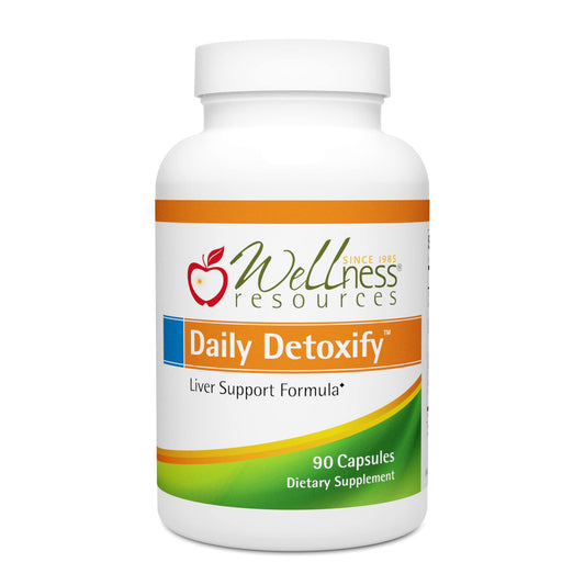 Wellness Resources Daily Detoxify bottle pour demonstrates easy daily detox support