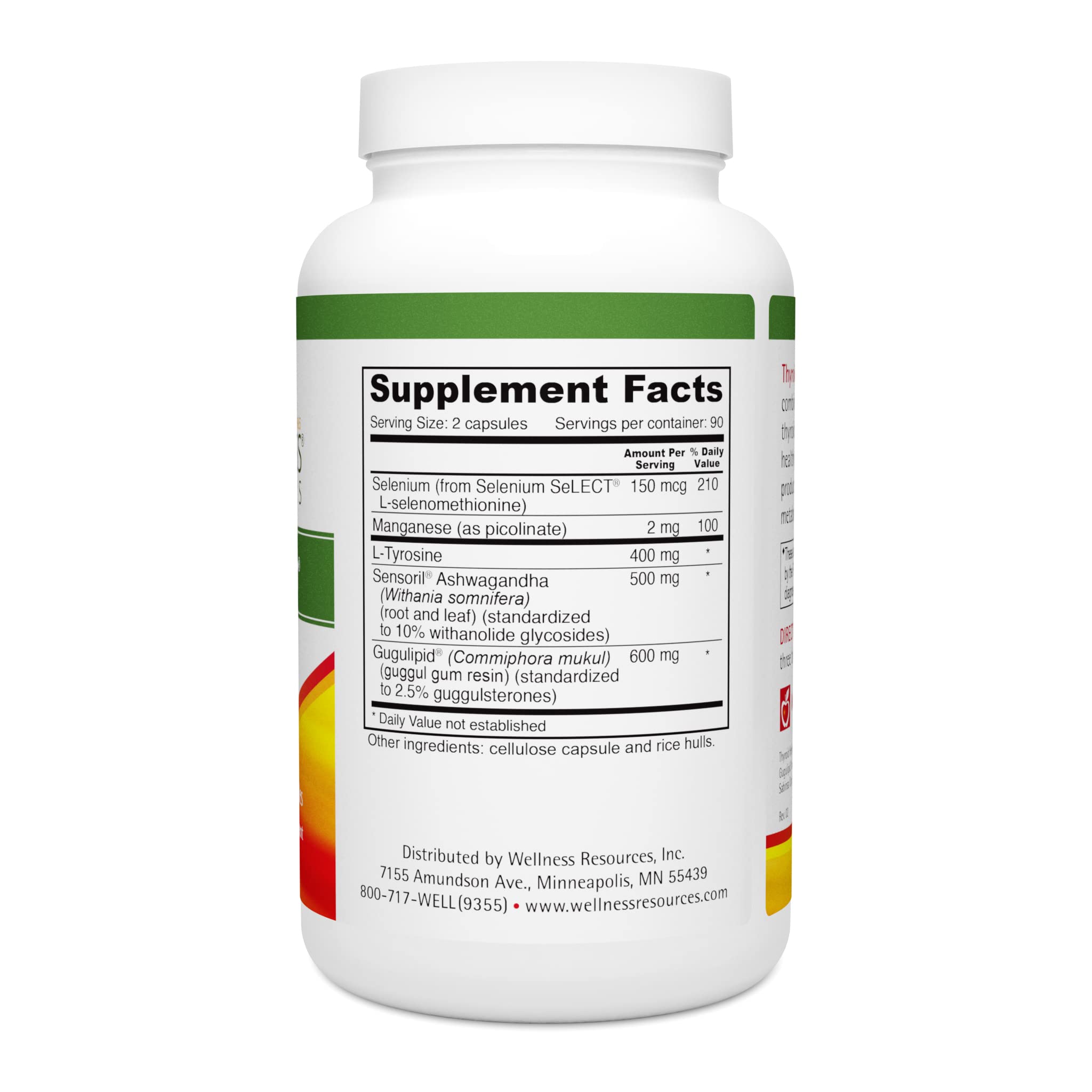 Glass of water beside Thyroid Helper pills for easy daily intake.