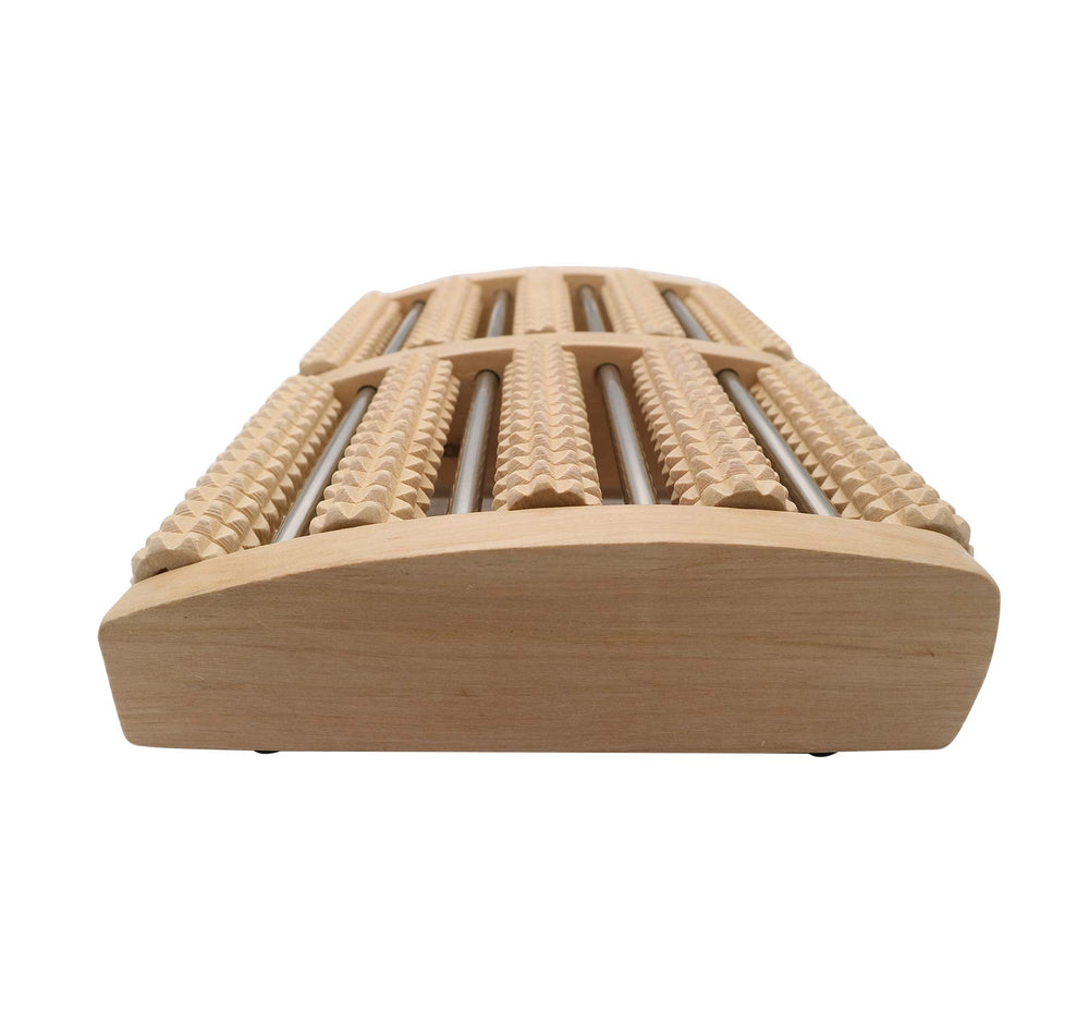 WELLWAY massager in use demonstrates target areas for arch and heel relief.