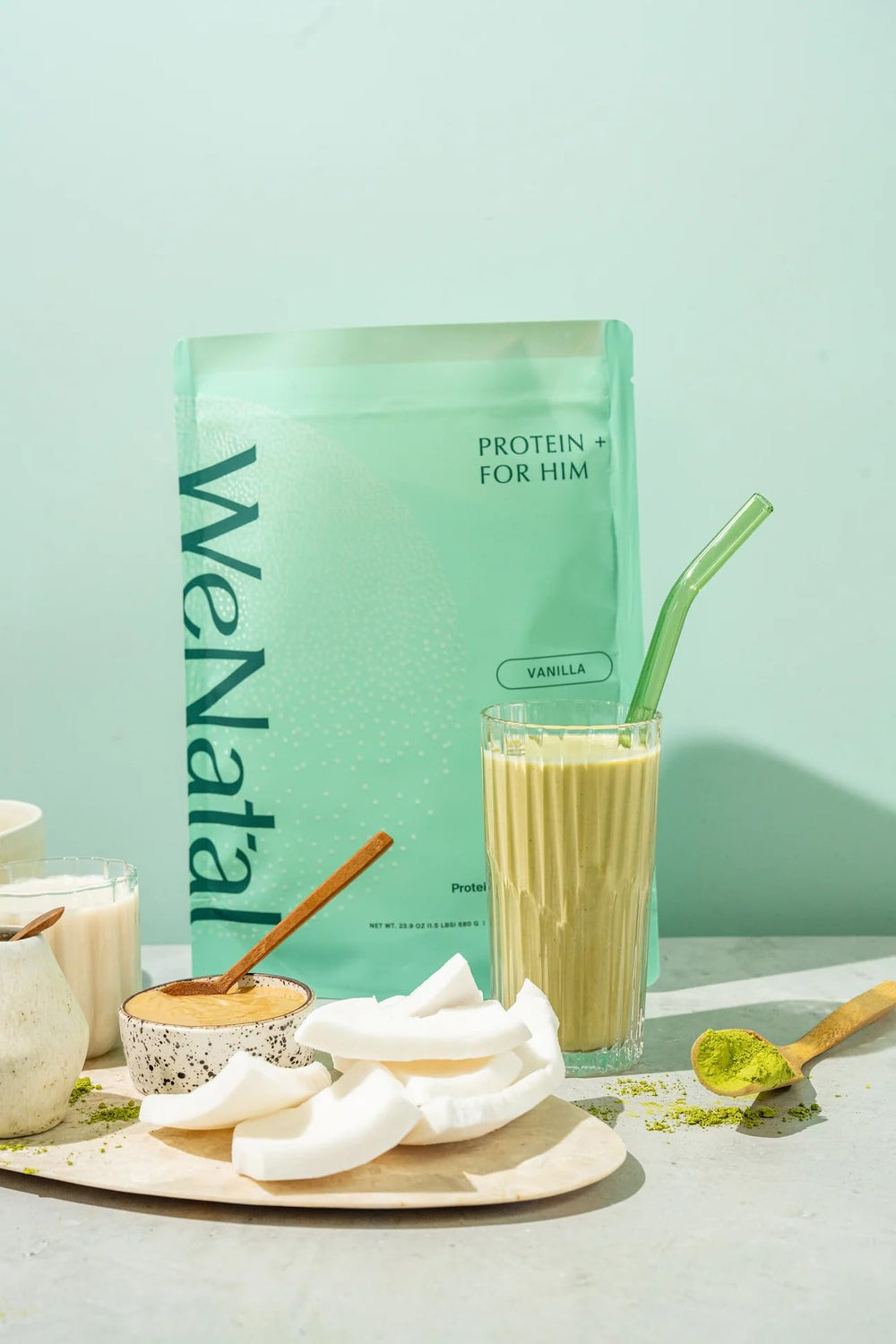 WeNatal Protein for Him measuring scoop for precise daily servings.
