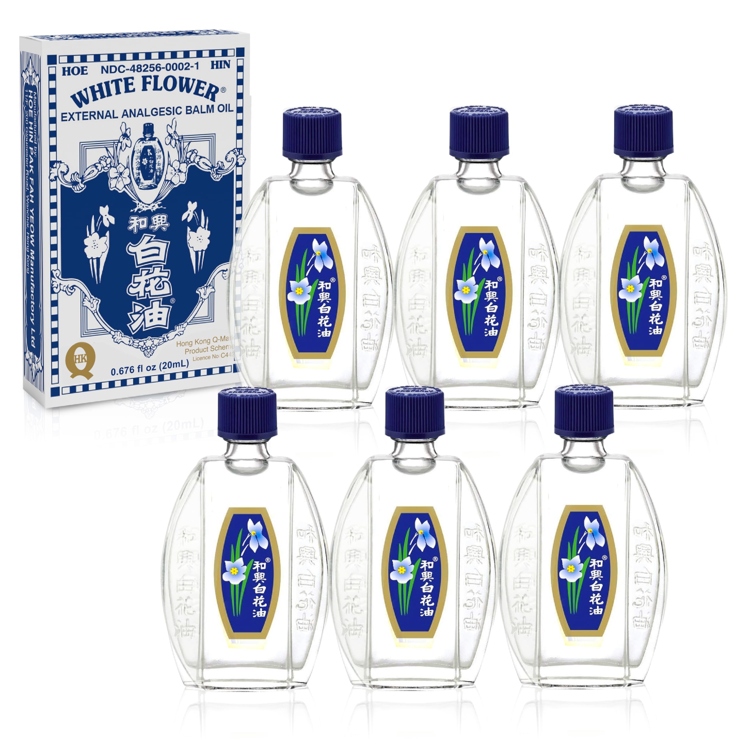 White Flower Balm Oil bottle pour for easy on-the-go application.