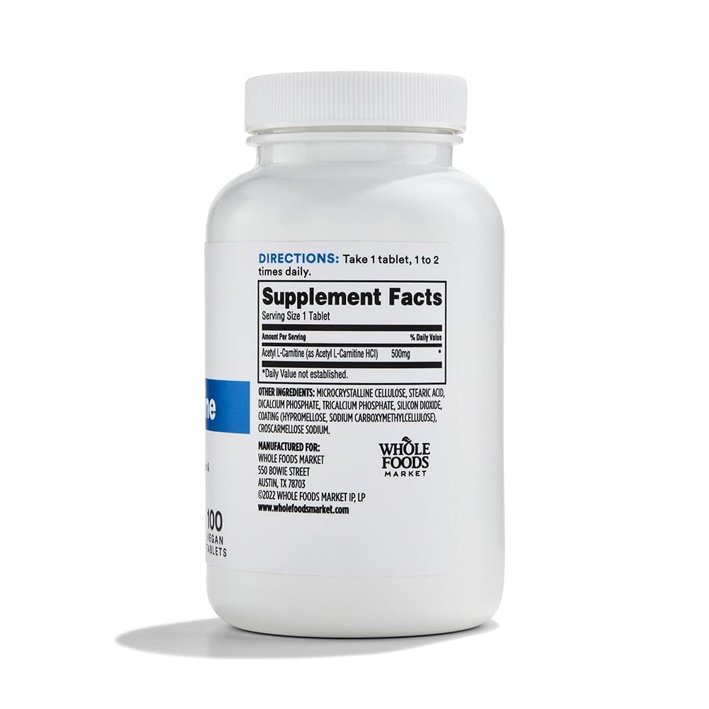 Acetyl L-Carnitine 500mg cap close-up on Whole Foods Market bottle for daily wellness.