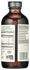 Whole Foods Market black seed oil bottle label showing ingredients and vegan, non-GMO quality