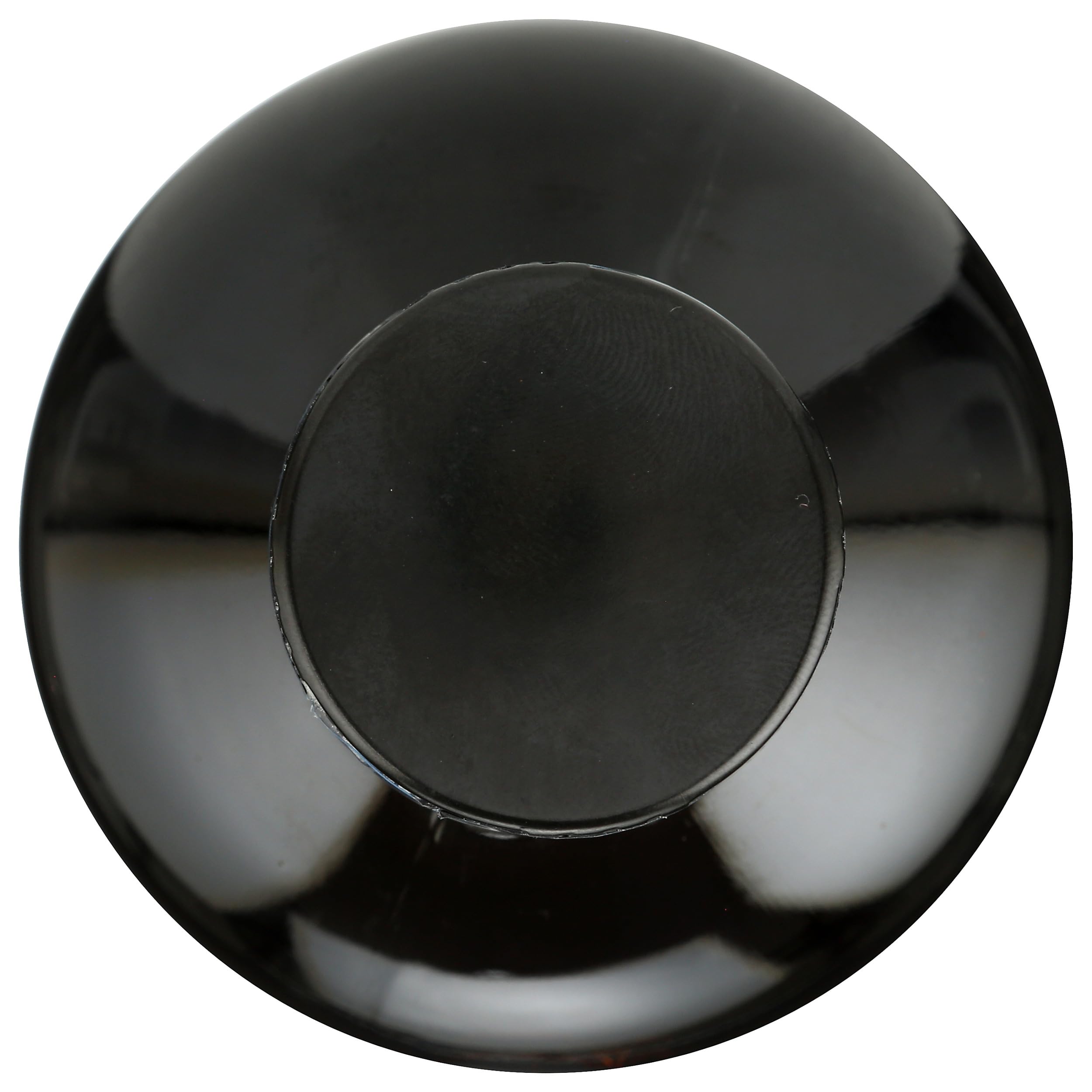Whole Foods Market organic black seed oil amber bottle close-up highlighting cold-pressed extraction