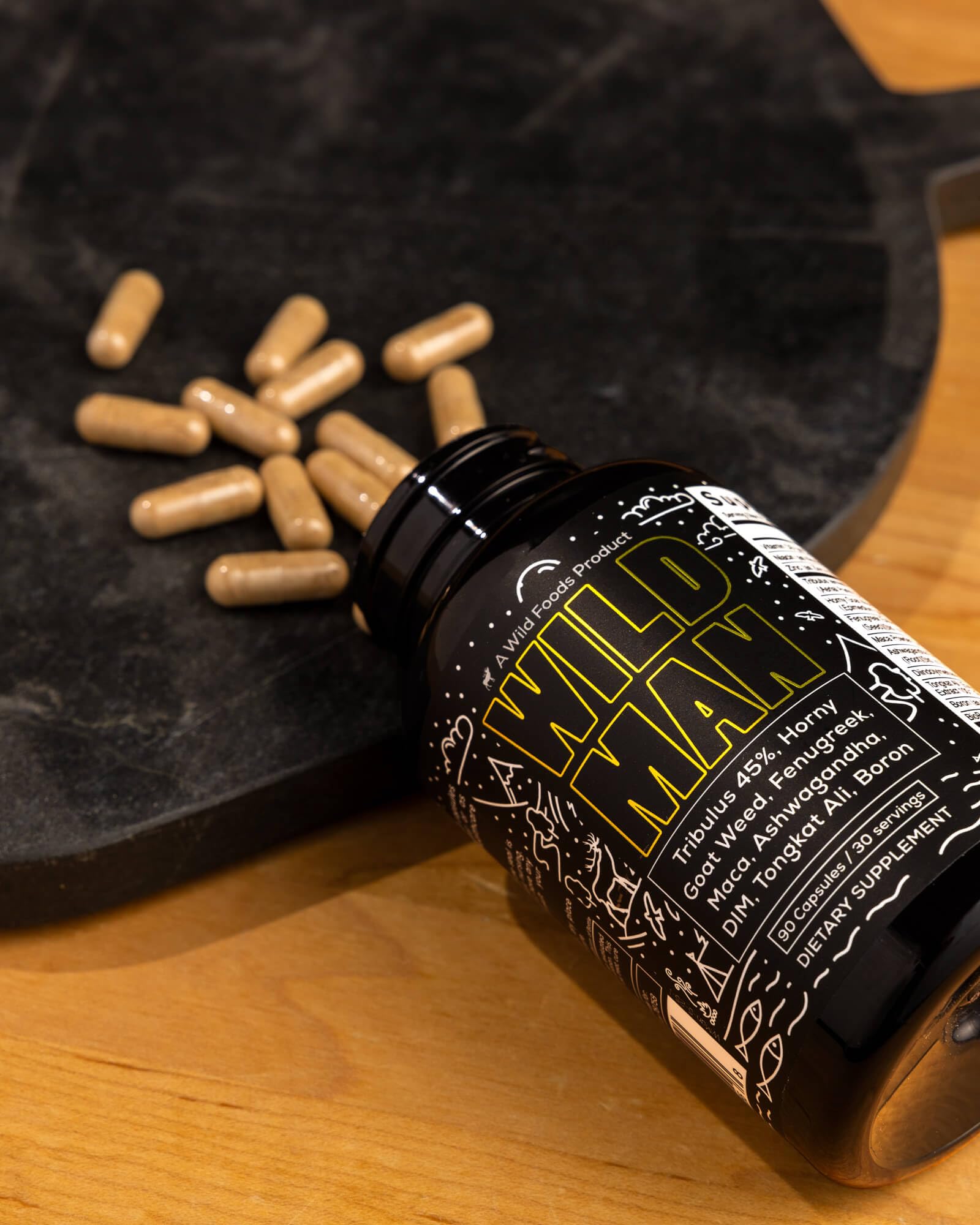 Wild Foods Herbal Stack for Man capsules in hand for everyday support