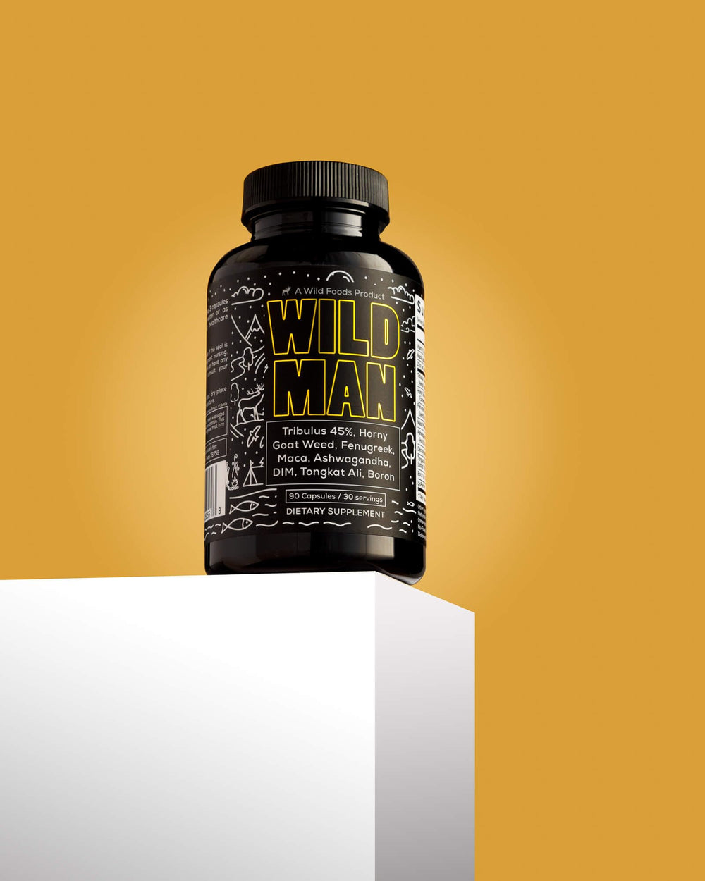 Wild Foods Herbal Stack for Man pouring a capsule from bottle