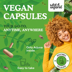 Wild & Organic Arjuna capsules pour from bottle; smooth, easy-to-take daily companion.