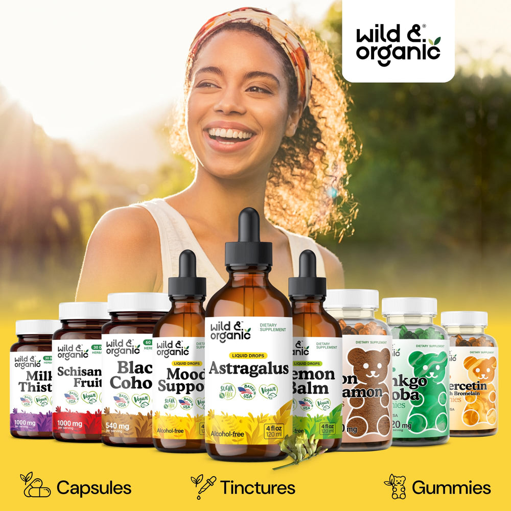 Wild & Organic astragalus tincture drops on a glass surface for convenient daily dosing