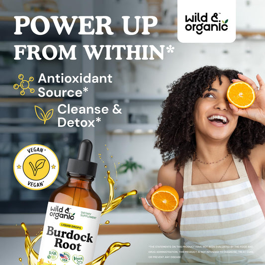 Pouring Wild & Organic burdock tincture drops for daily use