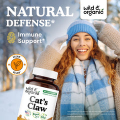 Wild & Organic Cats Claw capsules in hand demonstrate easy daily intake.