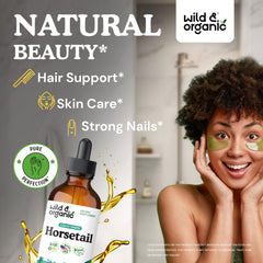 Wild & Organic horsetail tincture drops being poured for easy daily use