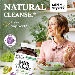Wild & Organic milk thistle capsules closeup showing smooth texture.