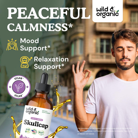 Pouring Wild & Organic Skullcap tincture to show glycerin-based drops