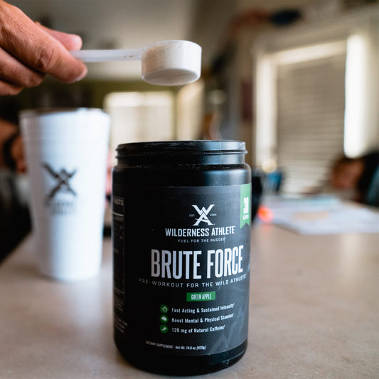 Brute Force scoop closeup highlighting serving size and powder texture for energy.