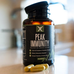Wilderness Athlete Peak Immunity capsules close-up highlighting NAC and zinc.