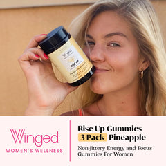 Winged Wellness Rise Up gummies poured, showcasing texture and pineapple flavor for focus.