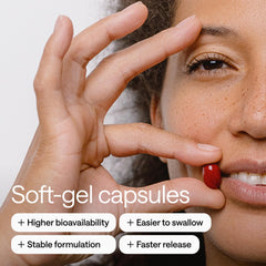 Wonder Family resveratrol near a glass of water for easy intake.