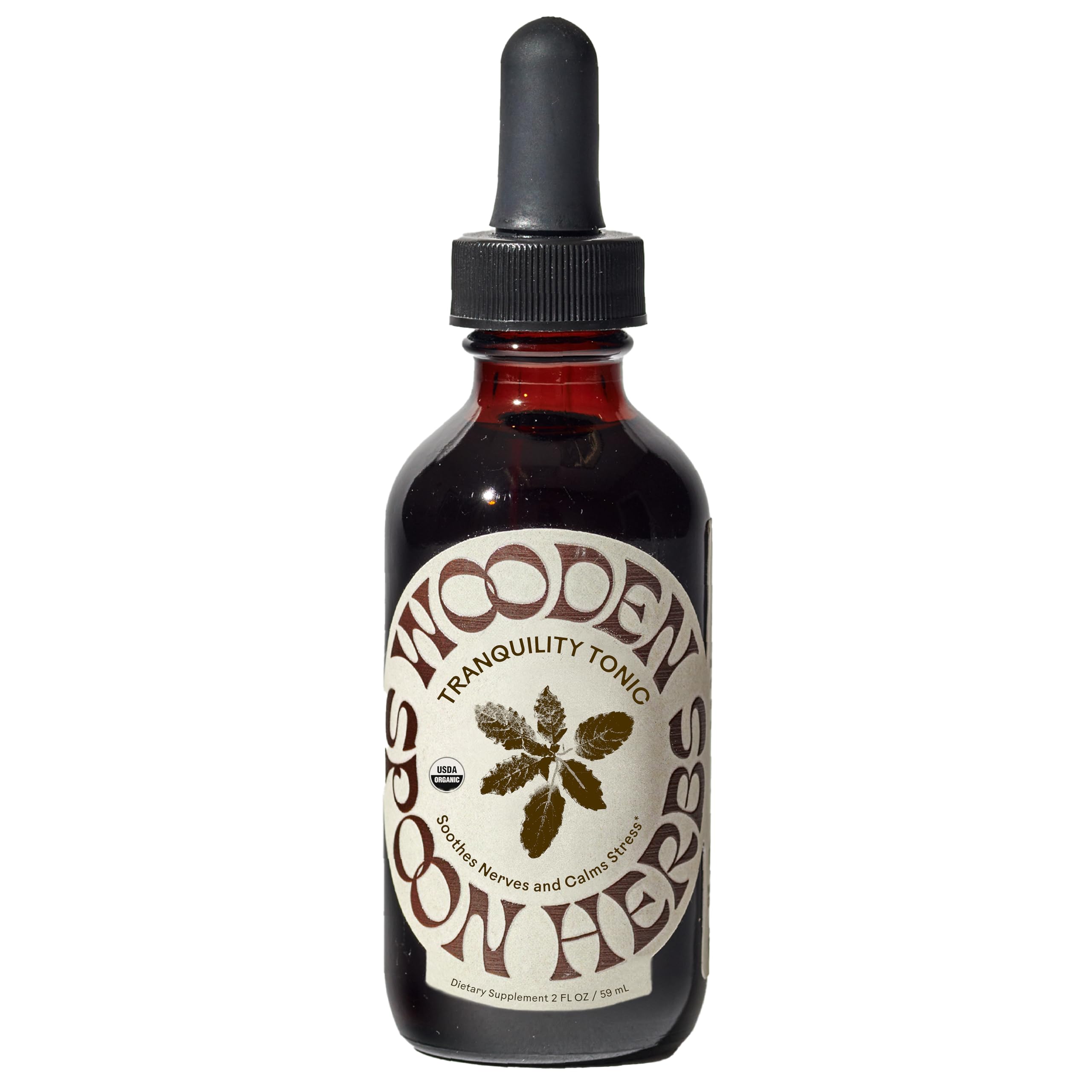Wooden Spoon Herbs Tranquility Tonic bottle showing organic six-herb blend for calm.