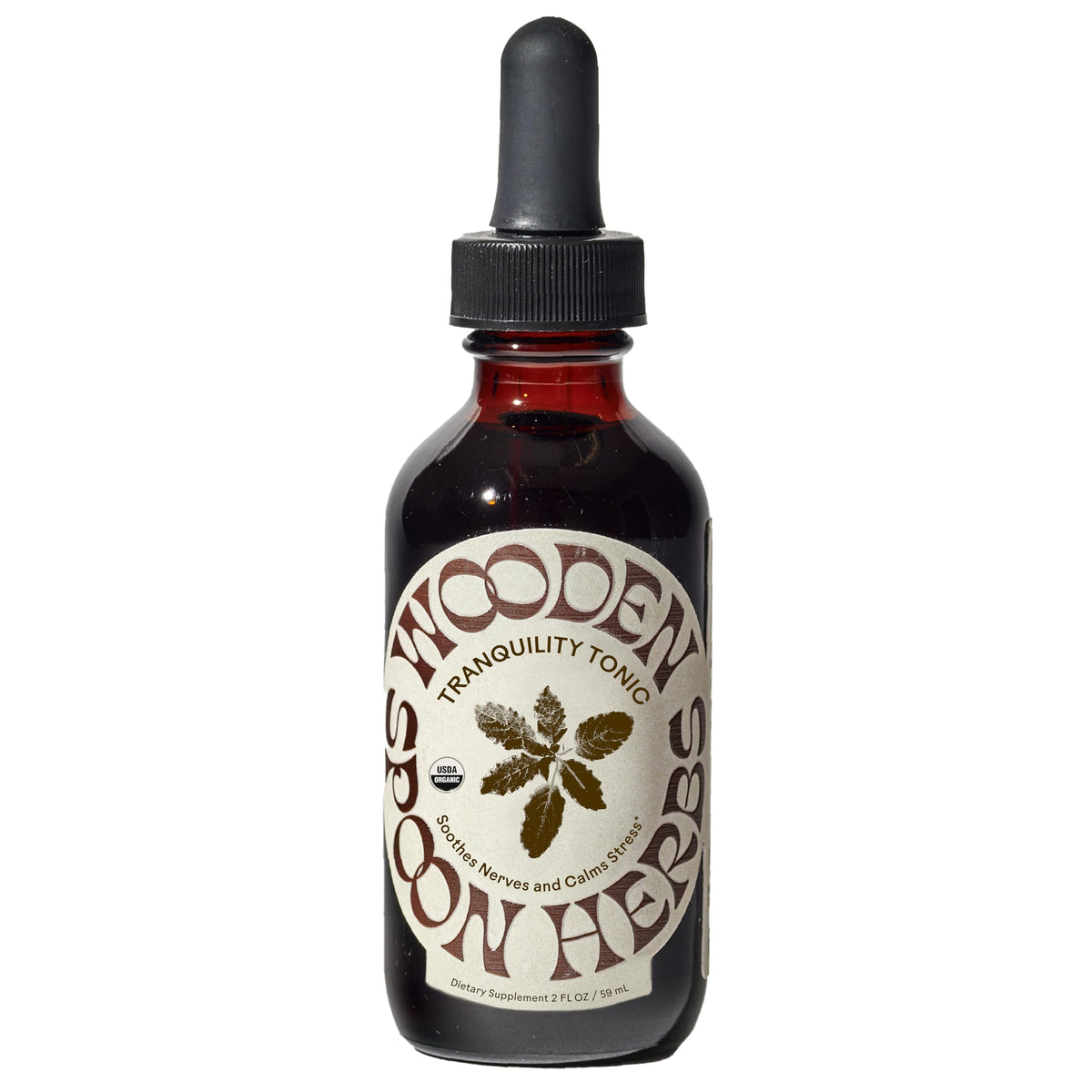 Wooden Spoon Herbs Tranquility Tonic bottle showing organic six-herb blend for calm.
