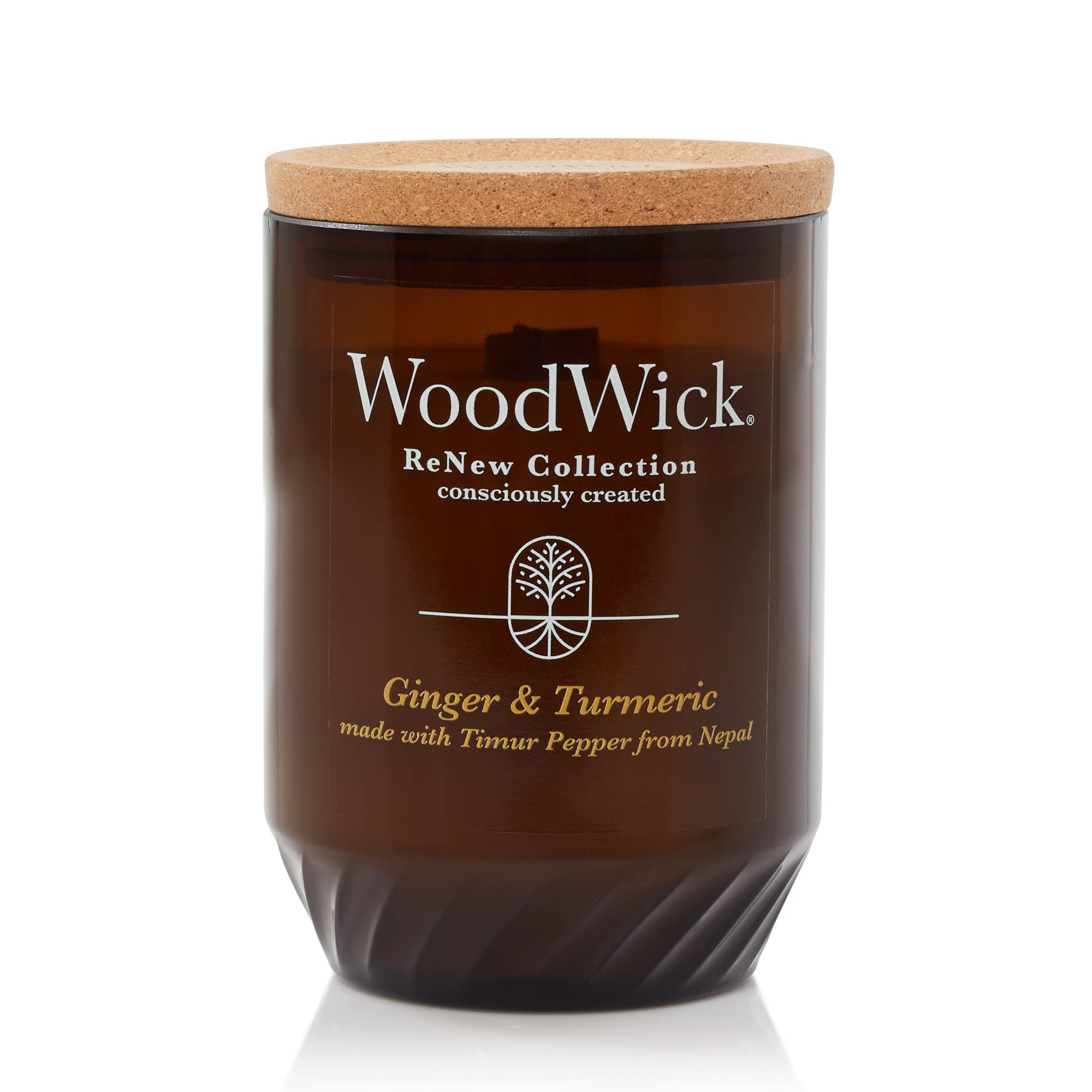 WoodWick Ginger & Turmeric Renew 13oz candle emitting a warm, inviting aroma for evenings