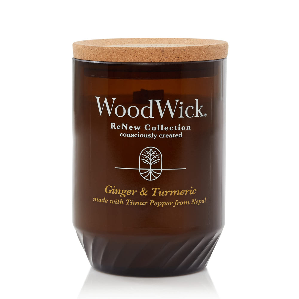 WoodWick Ginger & Turmeric Renew 13oz candle emitting a warm, inviting aroma for evenings