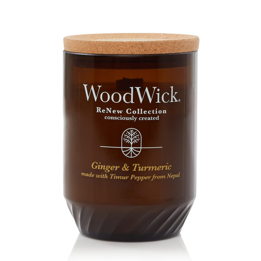 WoodWick Ginger & Turmeric Renew 13oz candle emitting a warm, inviting aroma for evenings