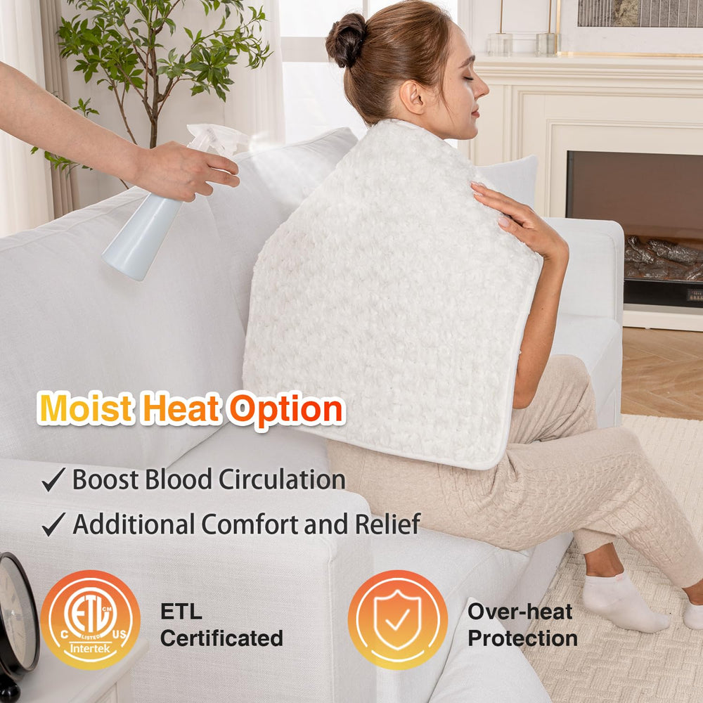 WOOMER heating pad moist heat mode activated for deeper warmth