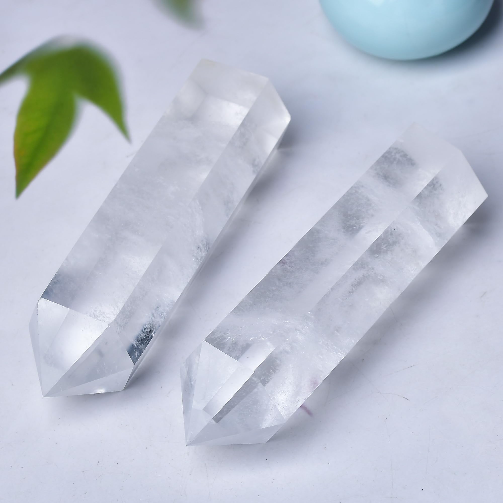 WUYOUSHI clear quartz towers used as grid centerpiece and energy tool.