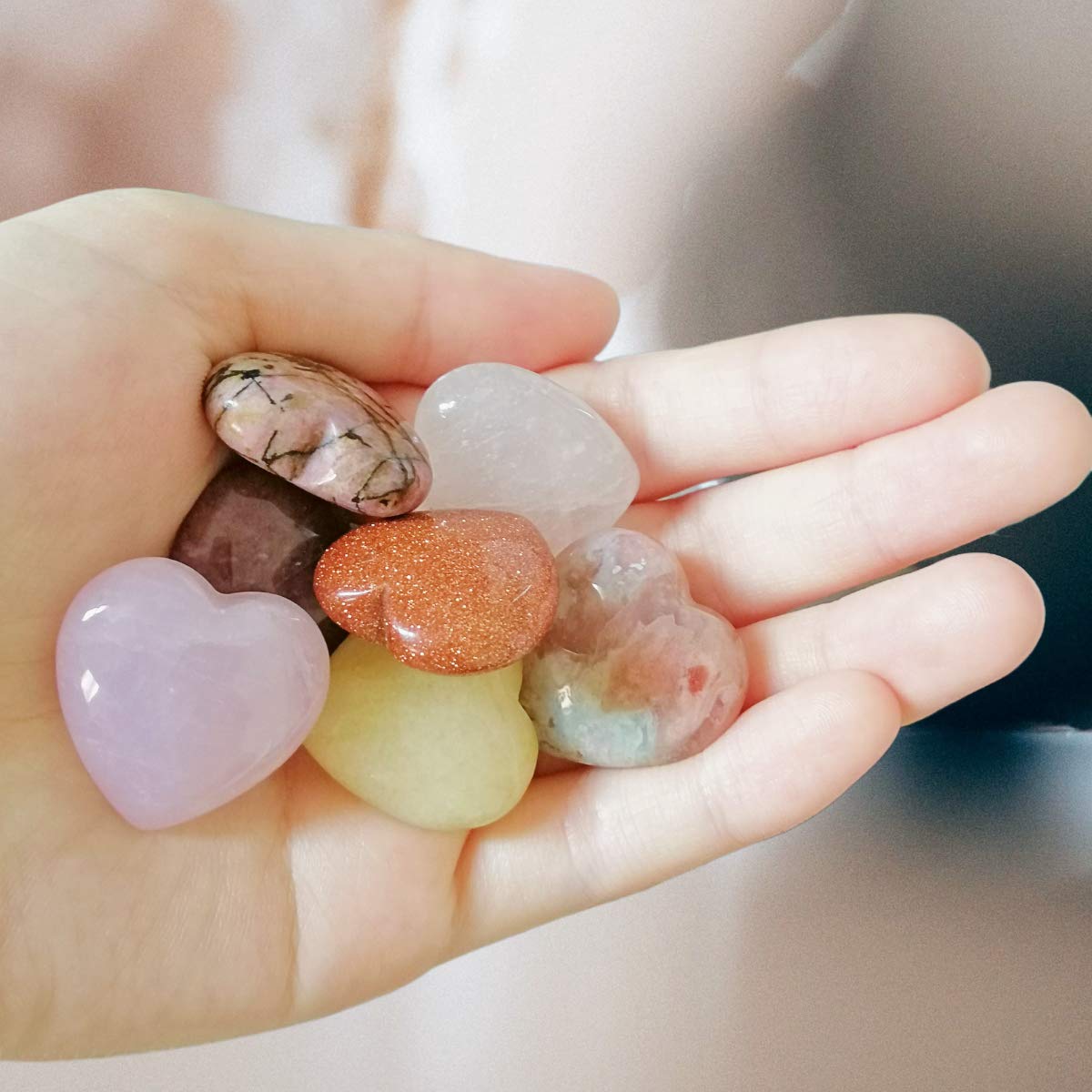 XMHOME stones neatly arranged in storage box for easy transport and display.