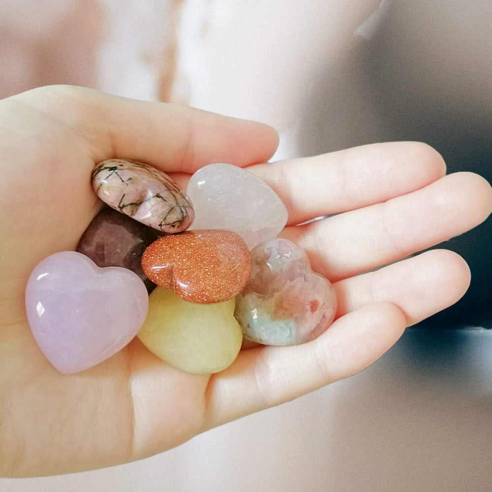 XMHOME stones neatly arranged in storage box for easy transport and display.