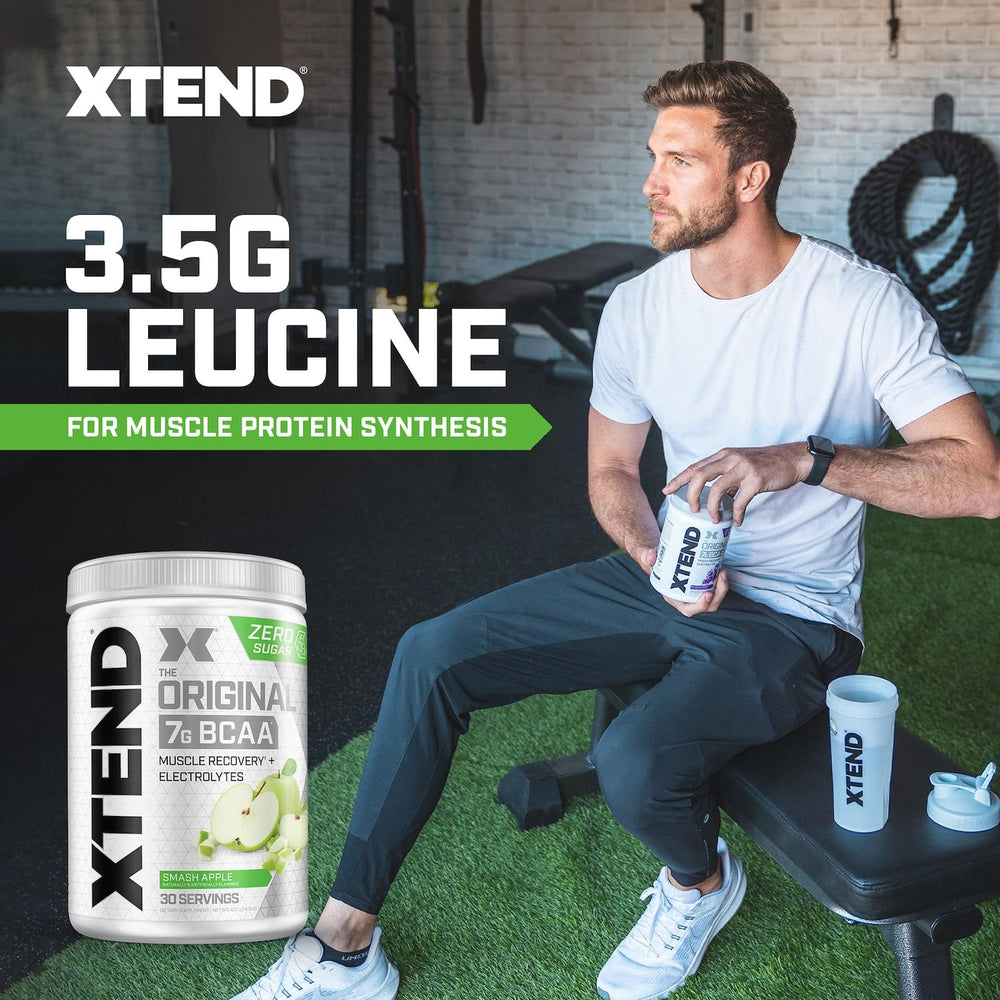 Xtend Original BCAA powder dissolving in water to demonstrate mixability and clarity.