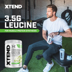 Xtend Original BCAA powder dissolving in water to demonstrate mixability and clarity.