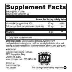 XYMOGEN Melatonin CR tablet close-up highlighting 5 mg dosage for sleep support.