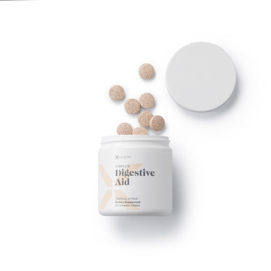 Xyngular Complete Digestive Aid bottle label close-up with key usage details.