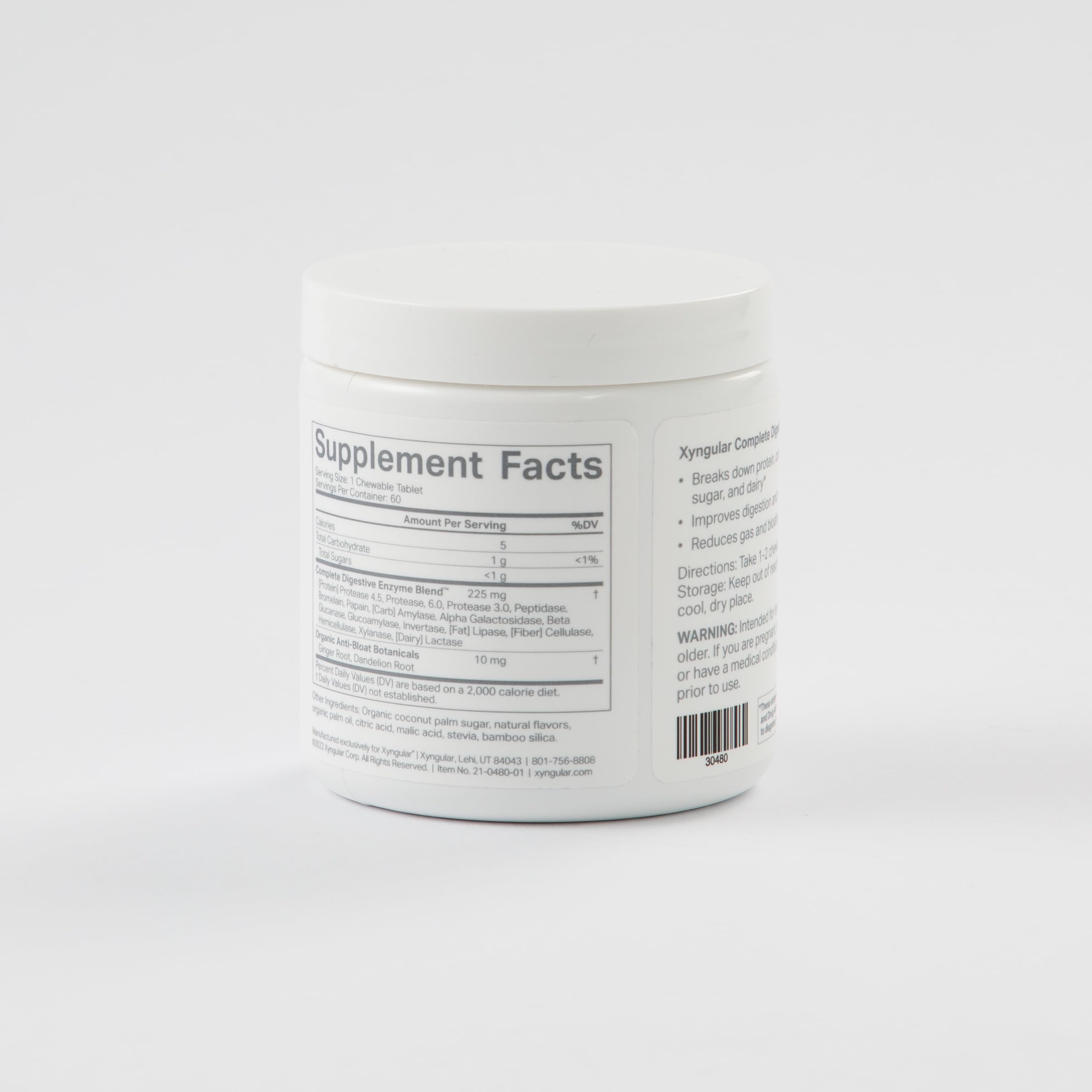 Xyngular Complete Digestive Aid bottle pour capturing a simple serving.