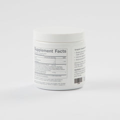 Xyngular Complete Digestive Aid bottle pour capturing a simple serving.