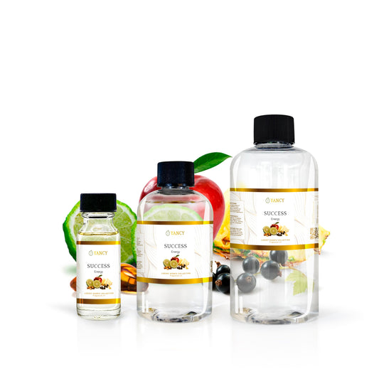 YANCY Success fragrance oil shown with an oil burner for a bold, inspiring aroma.