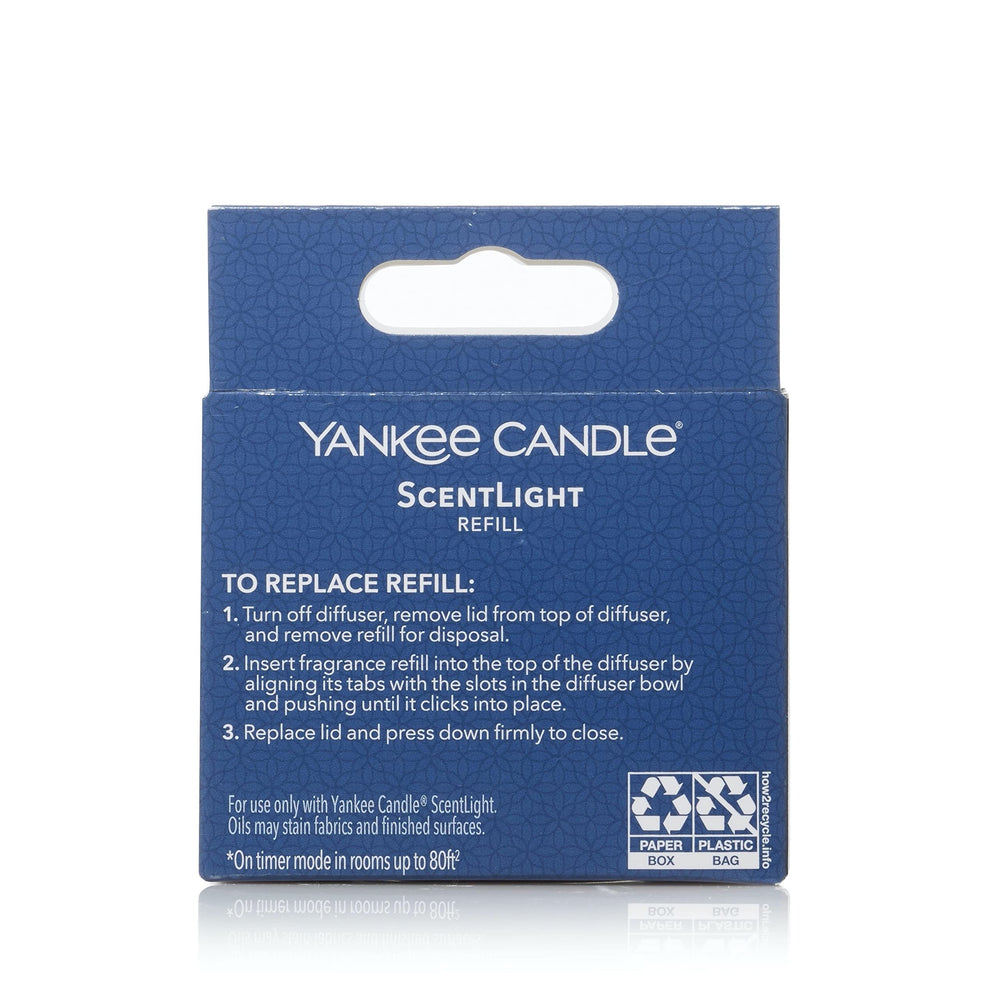 Yankee Candle Pink Sands ambience scene with soft glow for cozy rooms.