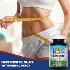 Hands holding detox capsules for convenient daily use.