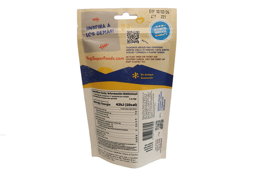 Scoop of Yogi Super Foods blue spirulina powder for color and protein boost.