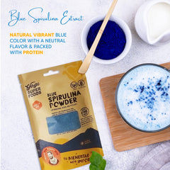 Blue spirulina powder swirls into smoothies for vibrant color and nourishment.