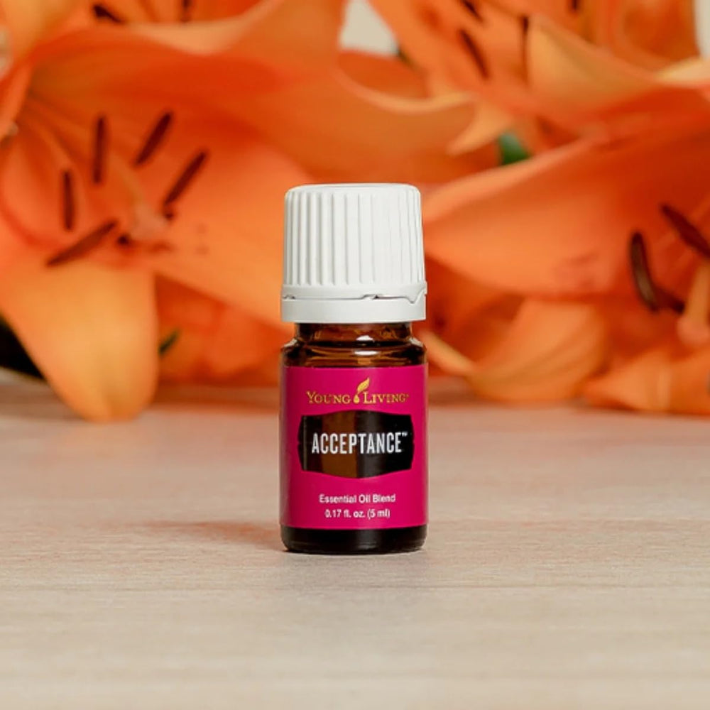 Acceptance bottle paired with an aromatherapy diffuser for mindful self-care.