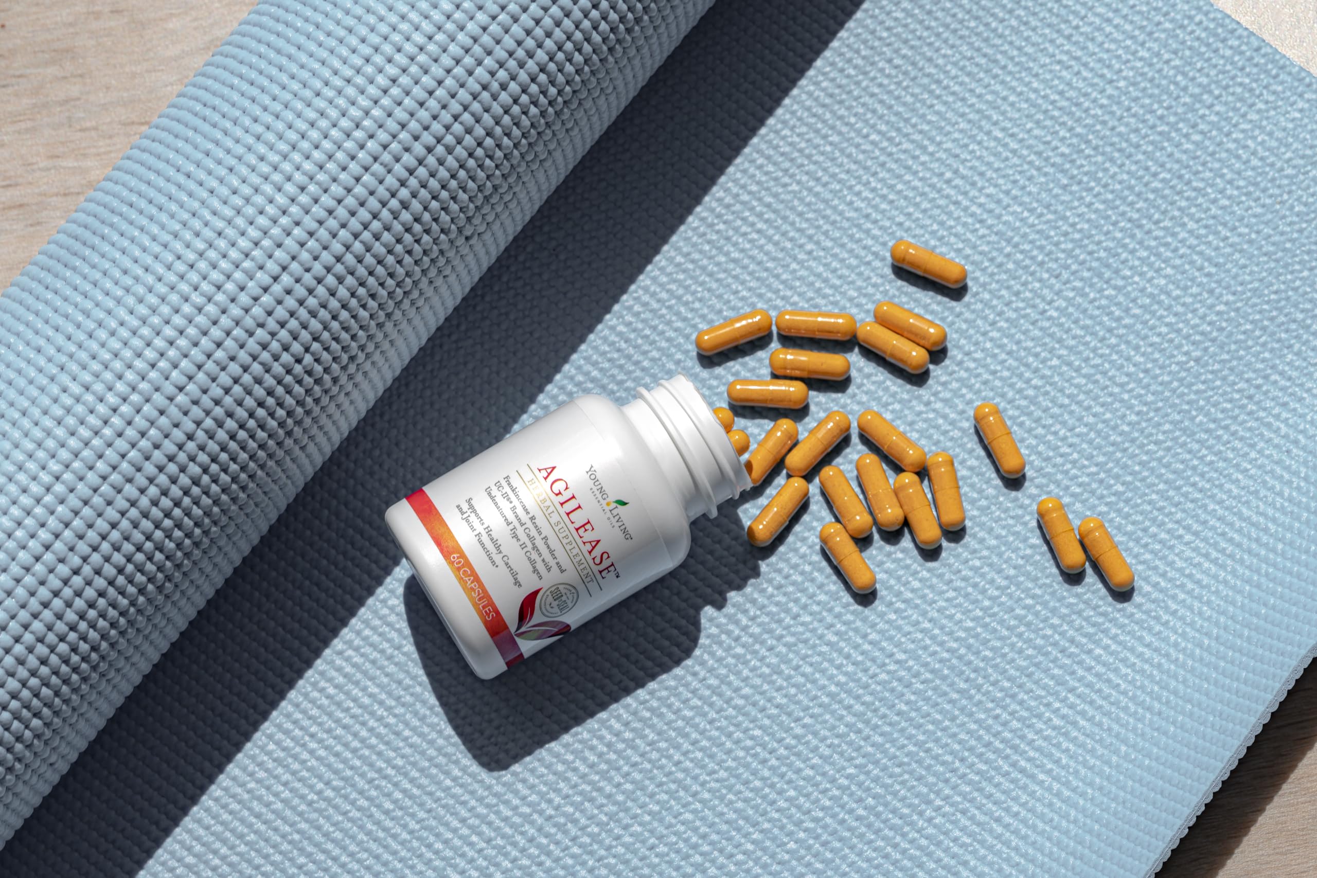 Young Living AgilEase open bottle with capsules for easy daily take.